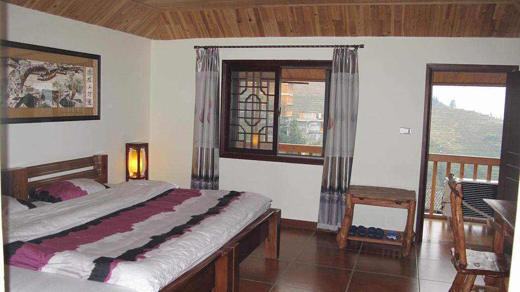 Longji Holiday Hotel Longsheng Zimmer foto