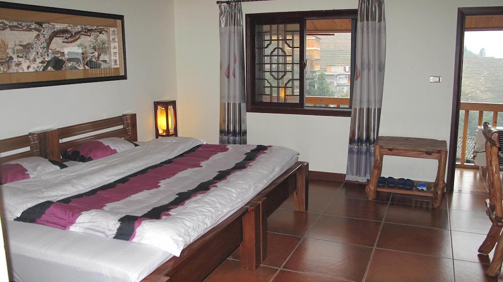 Longji Holiday Hotel Longsheng Zimmer foto